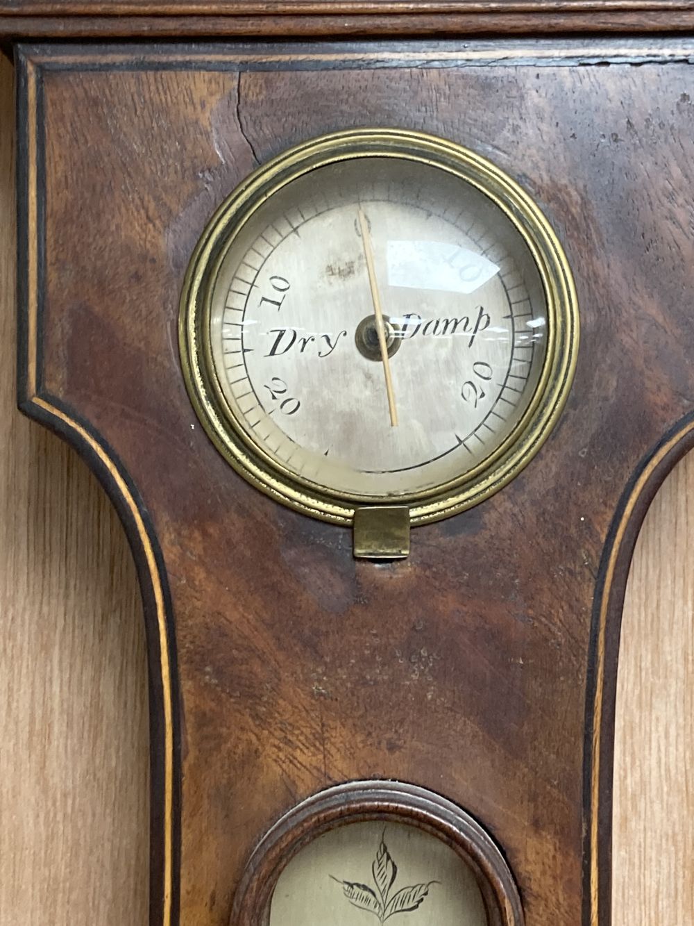 An early 19th century mahogany wheel barometer, marked Pastorelli, height 120cm